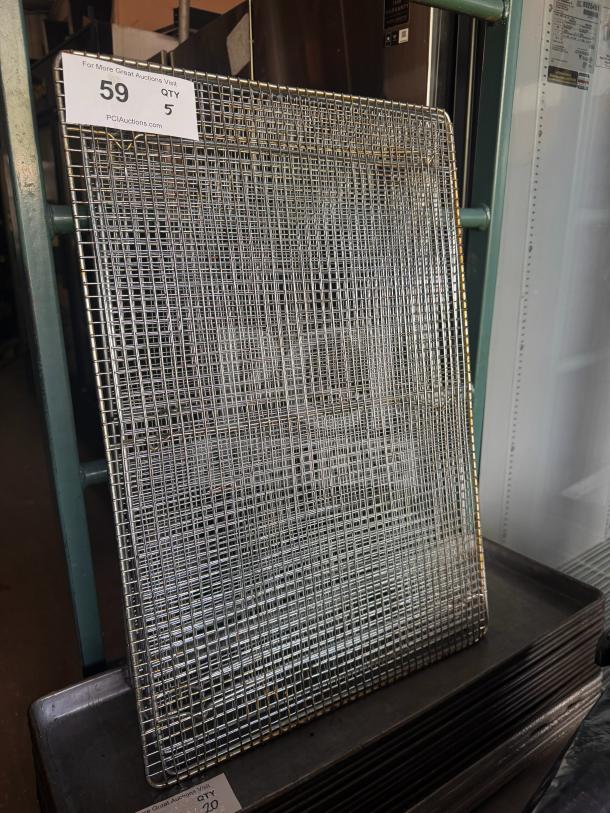 Stainless steel cooling rack with a grid pattern, in good condition, large size. Label shows auction lot number 59, quantity 5.