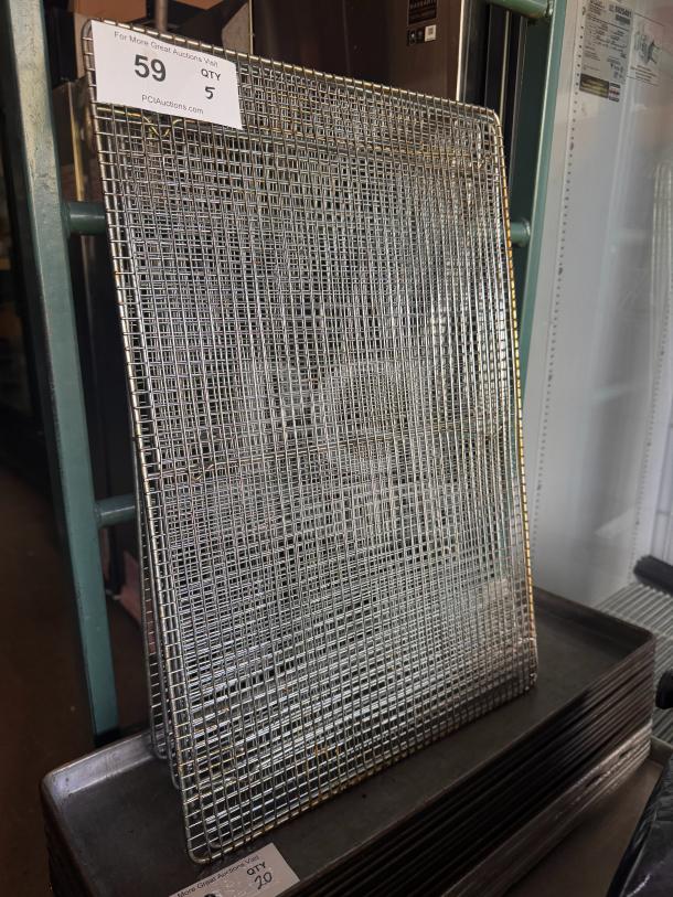 Stainless steel cooling rack, new condition, stack of five, ideal for baking or roasting, dimensions visible.