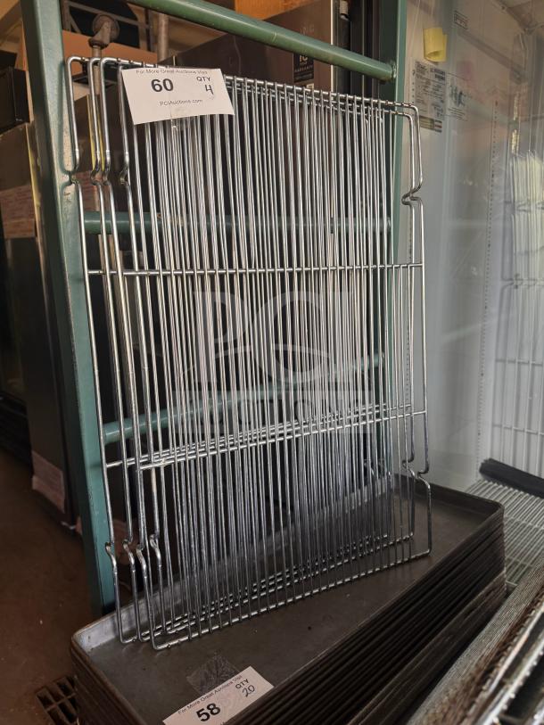 Metal cooling rack, sturdy construction, excellent condition, auction tag indicates quantity 4, item number 60.