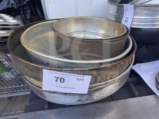 Lot of 5 assorted baking pans, various sizes and conditions, some rust visible. Auction tag reads "70 Qty" from PCIAuctions.com.