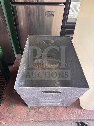 Steel galvanized utility bin with handles, rectangular shape, vented sides, and used condition. Ideal for storage use.