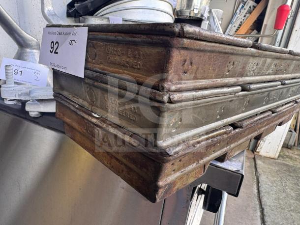 Lot of 3 Ekco E83 baking pans, pressed and hammered, in used condition with visible patina. Labels indicate model and make.