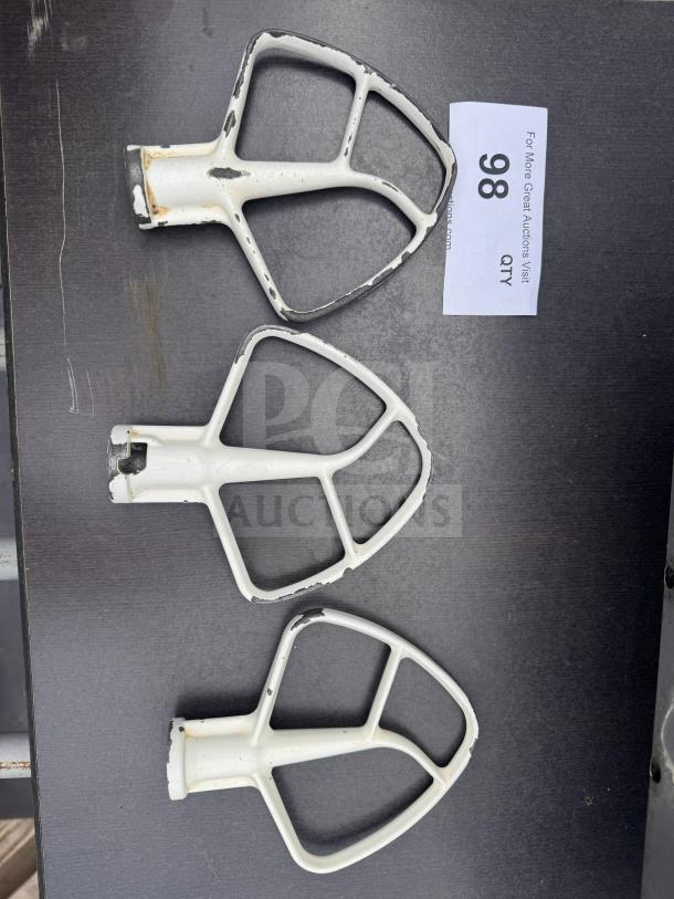 Lot of 3 KitchenAid stand mixer flat beater paddles with wear, visible chipping on edges. Auction tag number 98.