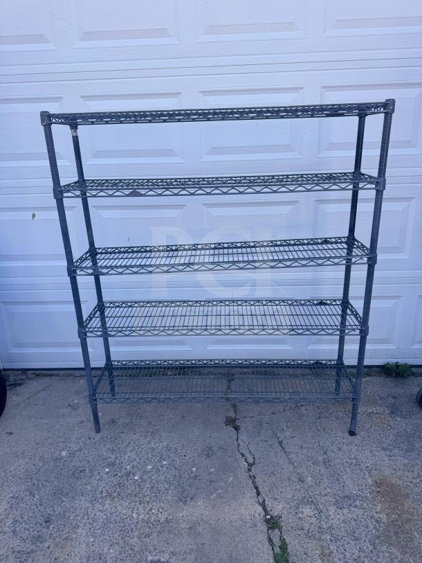 5-tier steel wire shelving unit, black, in good condition. Ideal for storage, featuring adjustable shelves and sturdy construction.