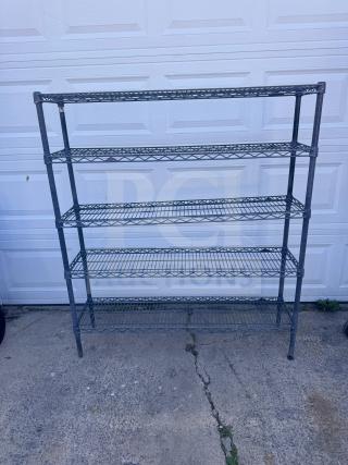 5-tier steel wire shelving unit, black, in good condition. Ideal for storage, featuring adjustable shelves and sturdy construction.