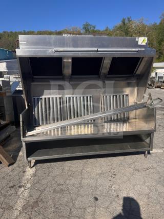 6 1/2 foot low profile commercial exhaust hood, stainless steel, suited for food trucks, includes grease filters, used condition.