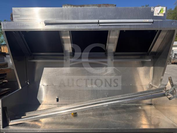 6 1/2 foot low profile commercial exhaust hood, stainless steel, ideal for food trucks, showing open vents and sturdy frame.
