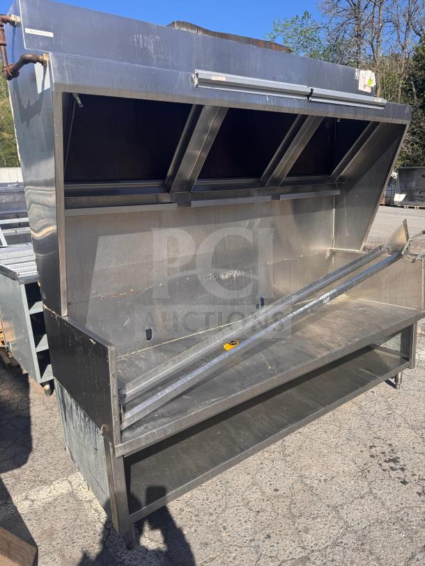 6 1/2 stainless steel low profile commercial exhaust hood, suitable for food trucks, in good condition with visible mounting brackets.