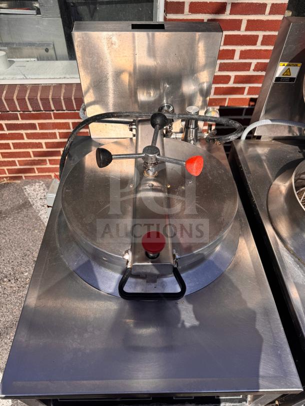 BKI FKM-FC commercial electric pressure fryer, stainless steel, 208 volts, sturdy handle, good condition, minor wear.