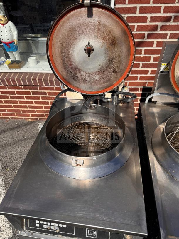 BKI FKM-FC commercial electric pressure fryer, stainless steel, open lid, control panel visible, 208 volts.
