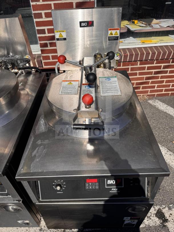 BKI FKM-FC commercial electric pressure fryer, 208 volts, stainless steel, control panel with dials and display, used condition.