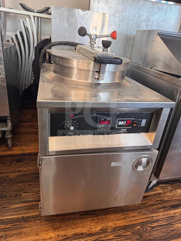 BKI FKM-F commercial electric pressure fryer, 208 volts, stainless steel, control panel with settings, used condition.