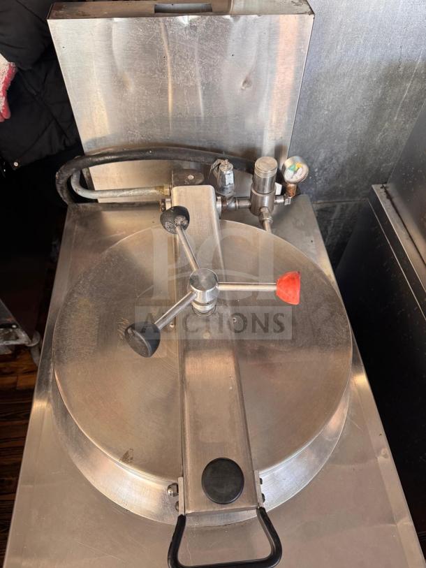 BKI FKM-F commercial electric pressure fryer, stainless steel, 208 volts, used condition, visible gauge and handle.