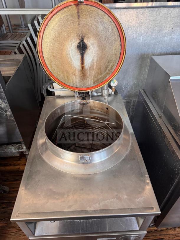 BKI FKM-F commercial electric pressure fryer, 208 volts, stainless steel, visible wear, suitable for high-volume frying.