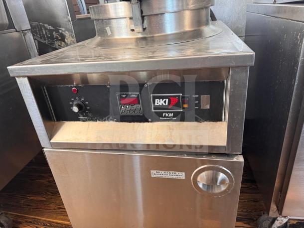 BKI FKM-F commercial electric pressure fryer, 208 volts. Stainless steel, visible control panel, used condition.