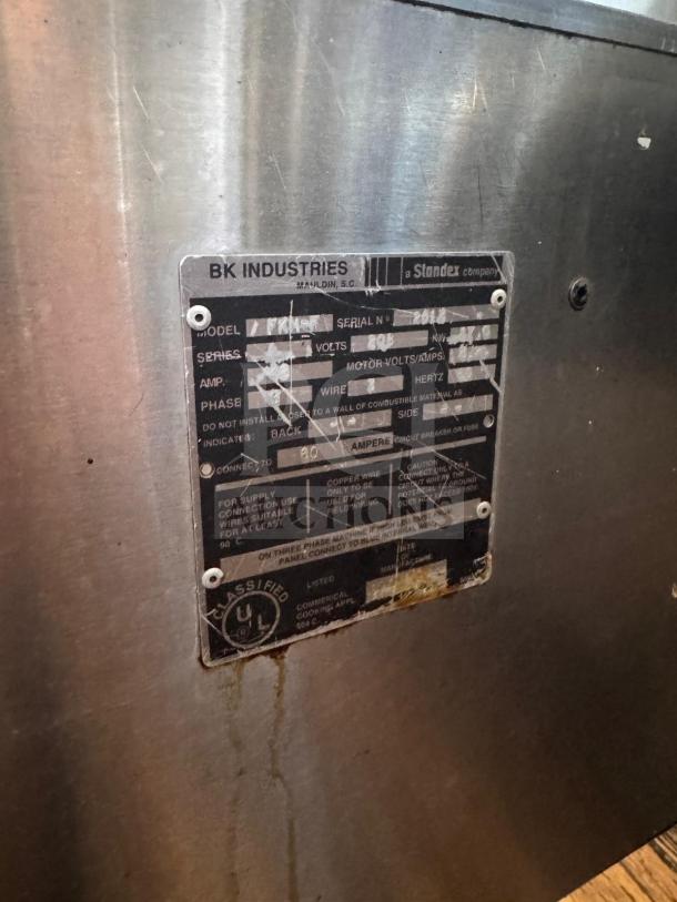 BKI FKM-F commercial electric pressure fryer, 208 volts, features manufacturer's label with specifications.