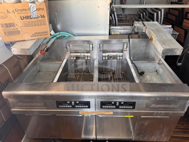 Frymaster FMRE222CSC double electric fryer with 2 dump stations, stainless steel, digital controls, used condition.