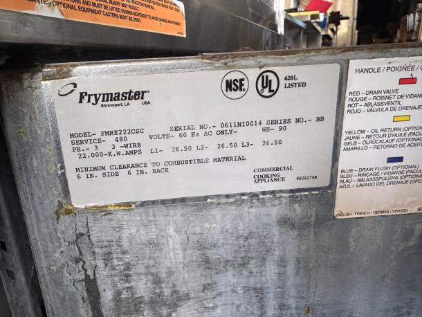 Frymaster FMRE222CSC Double Electric Fryer with 2 Dump Stations, tag shows model, serial no. 0611NI0014, NSF and UL listed.