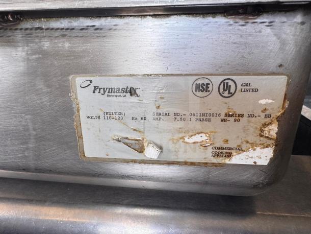 Frymaster FMRE222CSC double electric fryer, used, features 2 dump stations. Visible labels show model, serial numbers, and certifications.