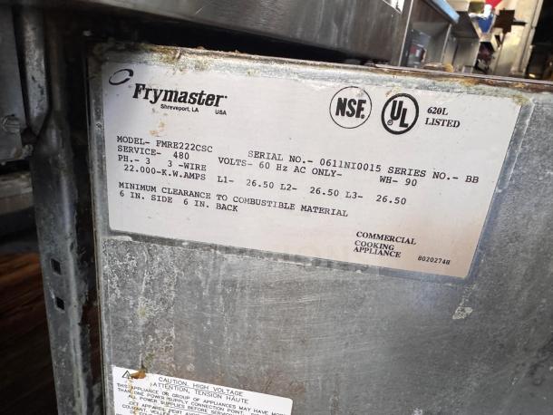 Frymaster FMRE222CSC Double Electric Fryer with 2 dump stations. Features include NSF, UL listing. Serial No. 0611NI0015.