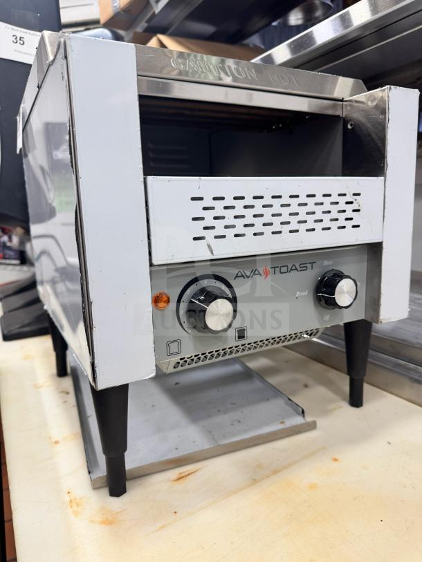 AvaToast Commercial Conveyor Toaster CTA7001, 2-slice capacity, stainless steel, control knobs visible, used condition.