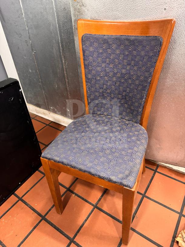 Dining side chair with wooden frame, featuring blue patterned upholstery. In good condition with minor wear.