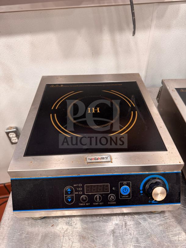 henGzhi IC-35A Commercial induction cooker, model IC-35A, with control panel and visible brand label, in used condition.