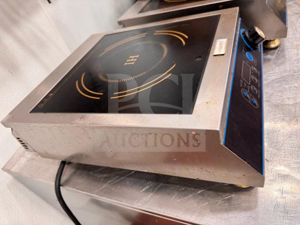 henGzhi IC-35A Commercial Induction Cooker, model IC-35A, featuring control dial, visible wear, and power indicators.