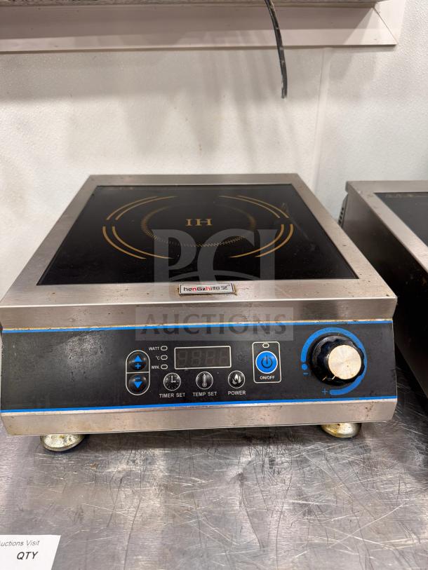 henGzhi IC-35A Commercial Induction Cooker, stainless steel, digital controls, visible wear, model IC-35A.