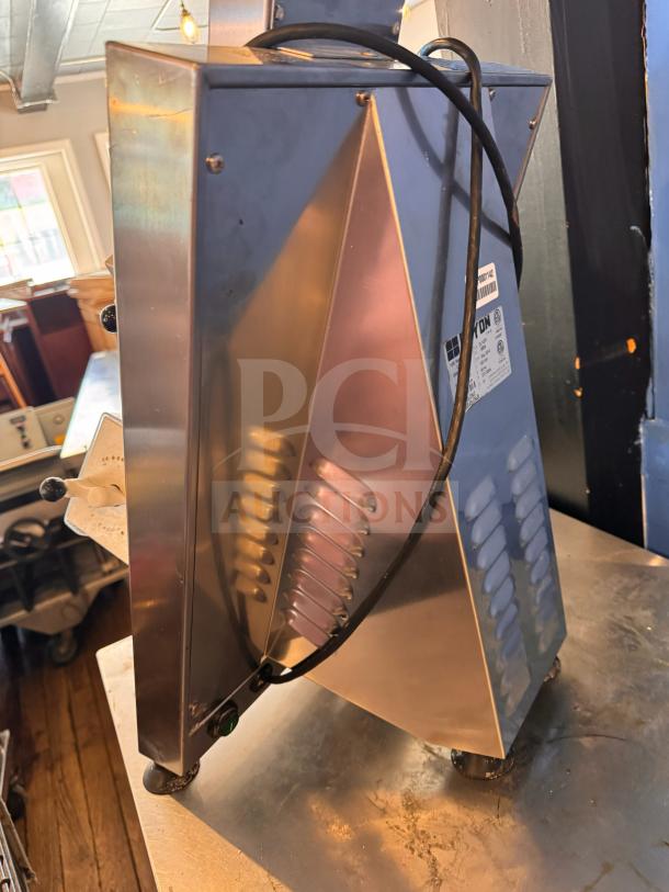 Doyon DL12DP countertop dough sheeter, stainless steel, electrical cord visible, in good condition.