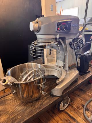 Hobart HL200 Legacy 20-Quart mixer with crack on right side; tested working; includes bowl and attachments.