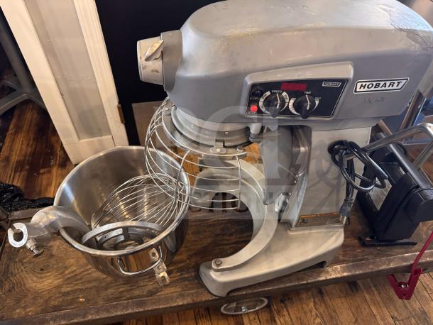 Hobart HL200 Legacy 20-Quart Planetary Bench Mixer, visible crack on right side, tested and working condition.