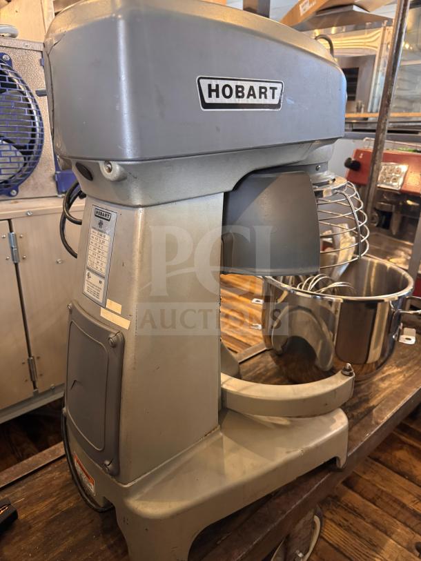 Hobart HL200 Legacy 20-Quart Planetary Bench Mixer, visible crack on right side, tested and working condition.
