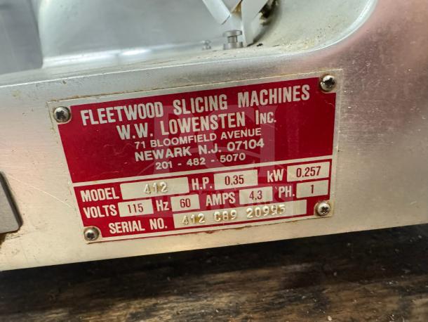 Fleetwood 412 slicer label showing model, volts, horsepower, and serial number. Marked by W.W. Lowensten Inc., Newark, NJ.