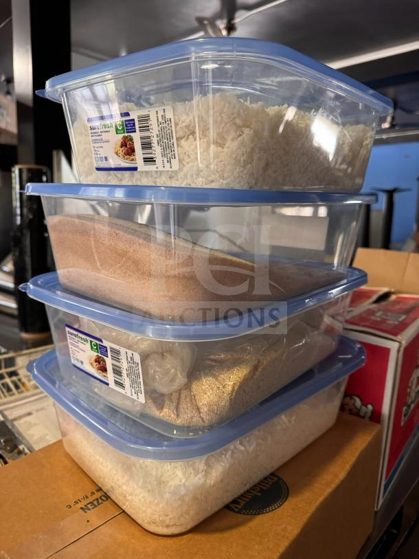 Stacked Sure Fresh storage food containers with blue lids, filled with rice and grains. Labels display product details.