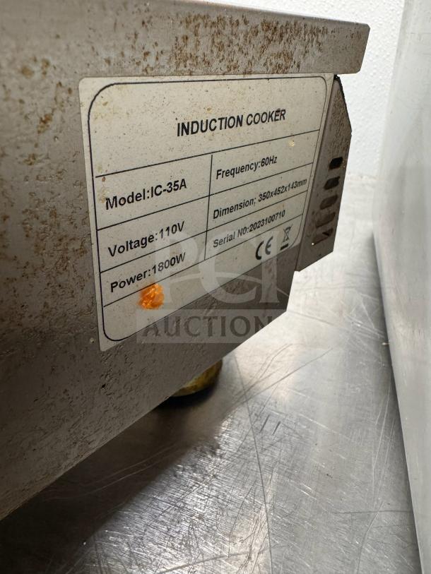 henGzhi IC-35A commercial induction cooker; 1800W, 110V, 60Hz; dimensions: 350x452x143mm; model, power, and voltage labeled.