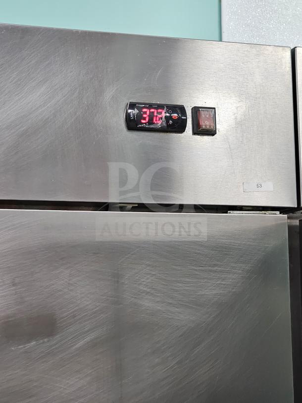 Avantco 54" solid door reach-in refrigerator with digital temperature display shown at 37°F, stainless steel finish.