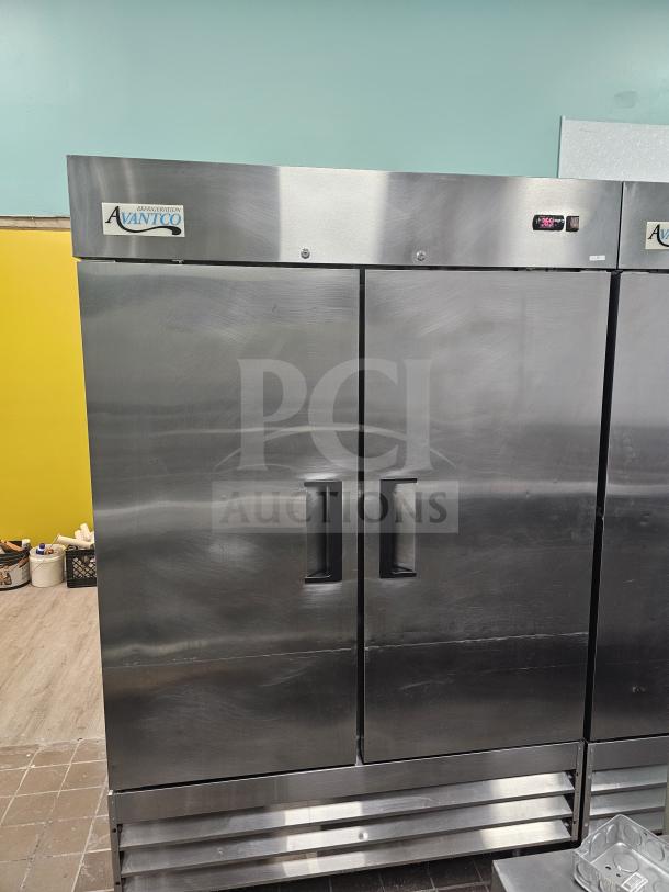 Avantco 54" solid door reach-in refrigerator, stainless steel, dual handles, digital temperature display, minor wear visible.
