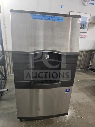 Manitowoc SPA310 ice dispenser, 180-lb storage, stainless steel finish, model details on label, used condition.