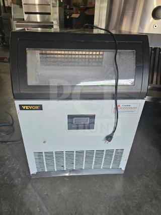 VEVOR SKF-E120F commercial ice maker, silver with digital display, visible power cord, gently used condition.