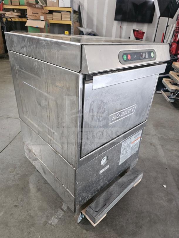Hobart XLI commercial undercounter dishwasher, stainless steel, used condition, visible control panel, model label intact.
