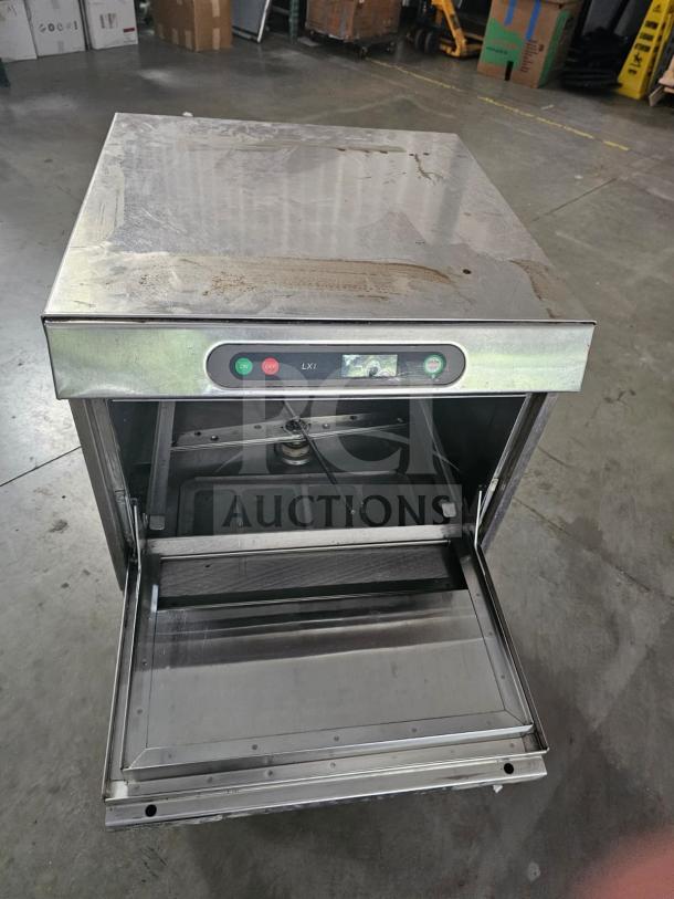 Hobart XLI commercial undercounter dishwasher, stainless steel, used condition, visible controls, open door, interior view.