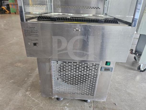 Omcan RS-CN-0250 open refrigerated display case in stainless steel, featuring a digital temperature display and ventilation grille.