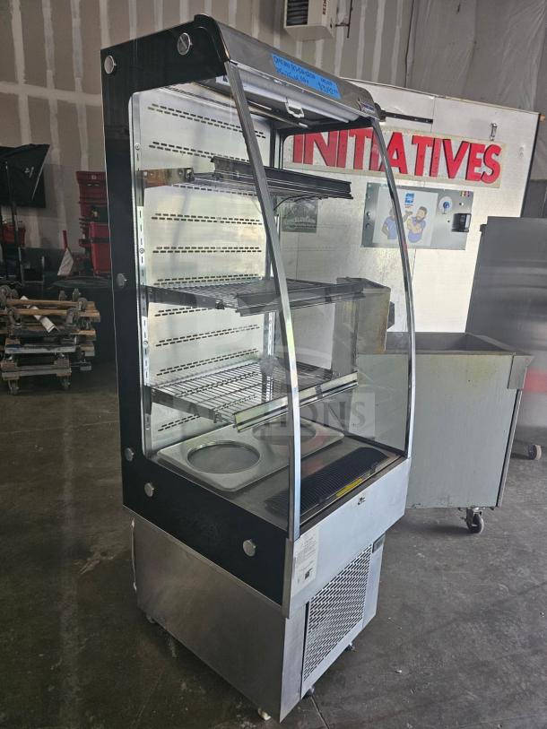 Omcan RS-CN-0250 refrigerated display case, open front, multiple shelves, black and silver, visible tags, good condition.