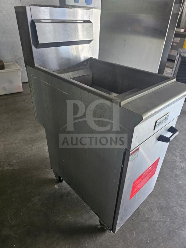 Commercial Falcon AF-90 gas fryer, 40-50 lbs capacity, stainless steel, used condition, on caster wheels with safety labels.
