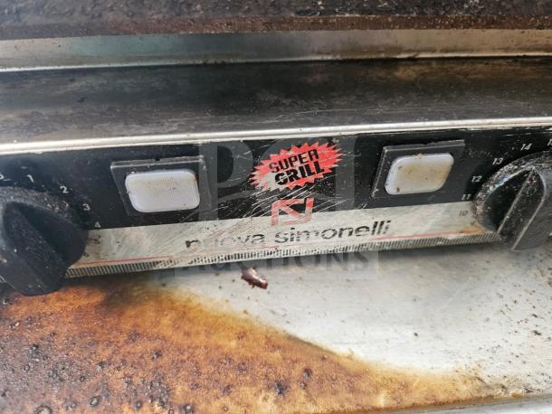 Nuova Simonelli Super Grill Commercial Double-bay panini grill with dual knobs, visible wear, and branded front panel.
