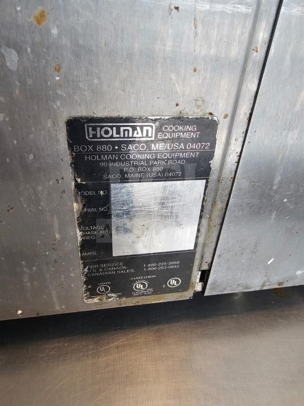 Holman QCS Series conveyor toaster with visible wear, model label shows UL listings; ideal for commercial kitchens.
