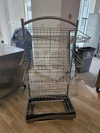 5-tier wire retail merchandising display with metal frame, arched top, and wire shelves. Used condition, ideal for stores.