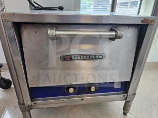 Bakers Pride electric countertop oven, stainless steel, used condition, visible brand logo, temperature controls.