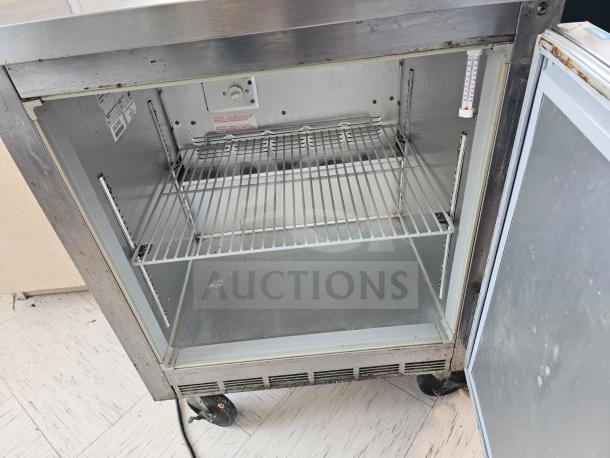 Beverage-Air WTF27A commercial undercounter refrigerator, stainless steel, single shelf, good condition, visible wear.